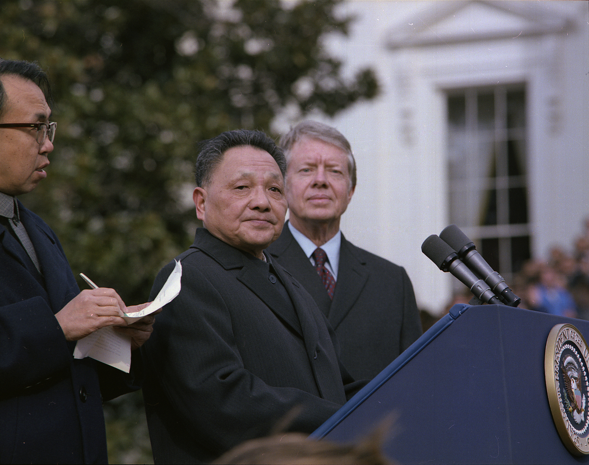 Deng_xiaoping_and_jimmy_carter_at_the_arrival_ceremony_for_the_vice_premier_of_china._-_nara_-_183157-restored