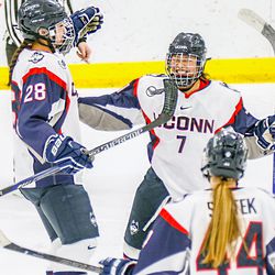 Kayla Mee (28) celebrates with Leah Lum (7) after Mee scored the first UConn goal.