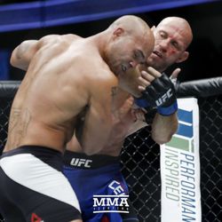 Donald Cerrone hits Robbie Lawler at UFC 214.