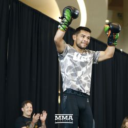 Ray Borg salutes the crowd at UFC 215 open workouts at the Rogers Place in Edmonton, Alberta, Canada.