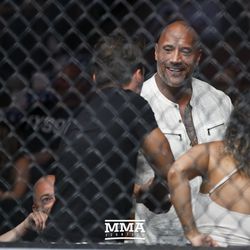 The Rock takes in the action at UFC 214.
