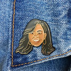 thefoundretail <a href="https://www.etsy.com/listing/477805833/michelle-obama-enamel-pin-first-lady?ga_order=most_relevant&ga_search_type=all&ga_view_type=gallery&ga_search_query=pins&ref=sr_gallery_7">Michelle Obama Enamel Pin</a>, $10