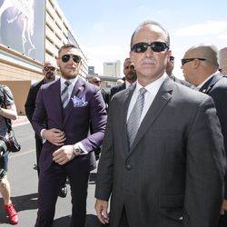 Conor McGregor makes his way to stage Tuesday.