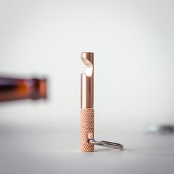 Future Relic <a href="https://www.etsy.com/listing/254968637/bottle-opener-keychain-edc-tool-bronze?ga_order=most_relevant&ga_search_type=all&ga_view_type=gallery&ga_search_query=bottle%20opener%20keychain&ref=sr_gallery_1">Bronze Bottle Opener Keychain</a>, $15