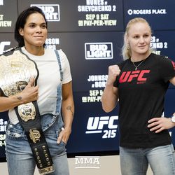 Amanda Nunes and Valentina Shevchenko pose for the cameras at UFC 215 media day at the Rogers Place in Edmonton, Alberta, Canada.