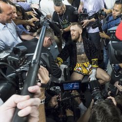 Conor McGregor answers questions Friday.