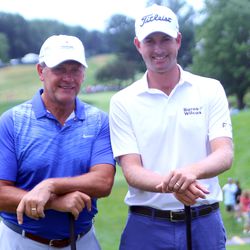 Geno Auriemma (L) and Webb Simpson (R) at the 2017 Travelers Championship Pro-Am.<br>