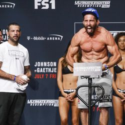 Jesse Taylor hits the scale at the TUF 25 Finale ceremonial weigh-ins Thursday at Park Theater in Las Vegas.
