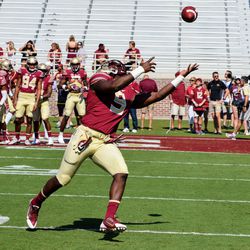 NCSU at FSU:  JR RB Jacques Patrick reaches for a pass during warmups.