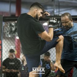 Kelvin Gastelum throws some knees at UFC on FOX 25 open workouts Thursday at UFC Gym in New Hyde Park, N.Y.