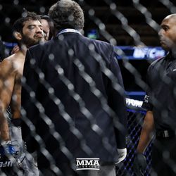 Gilbert Melendez gets checked on between rounds at UFC 215.