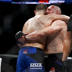 Patrick Cummins and Gian Villante hug after their UFC on FOX 25 match.