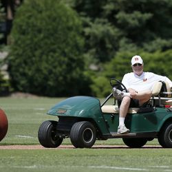 Owner Mike Brown sits in his cart watching Bengals OTAs.