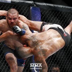 Anthony Pettis lands a high-flying kick at UFC 213.