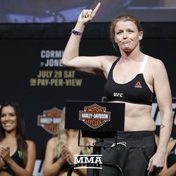 Tonya Evinger signals to the crowd.