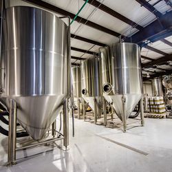 Part of the experience is seeing that brewery and all the equipment in it, like these fermentation tanks.