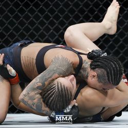 Ashlee Evans-Smith battles Sarah Moras at UFC 215.