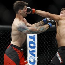 Jack Marshman connects on Ryan Janes at UFC Fight Night 113 on Sunday at the The SSE Hydro in Glasgow, Scotland.