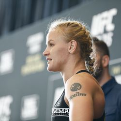 Valentina Shevchenko speaks to the crowd at UFC 215 open workouts at the Rogers Place in Edmonton, Alberta, Canada.