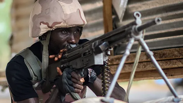 A Nigerian soldier standing guard.