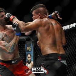 Ryan Janes and Jack Marshman exchange at UFC Fight Night 113 on Sunday at the The SSE Hydro in Glasgow, Scotland.