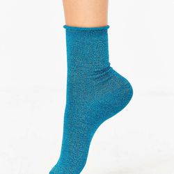 Out From Under <a href="http://www.urbanoutfitters.com/urban/catalog/productdetail.jsp?id=40408619&category=GIFTS-UNDER12&color=046">Sparkle Party Anklet Sock</a> ($9)