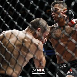 Anthony Pettis lands a strike at UFC 213.