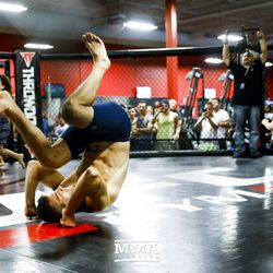 Chris Weidman and his kids warm up at UFC on FOX 25 open workouts Thursday at UFC Gym in New Hyde Park, N.Y.