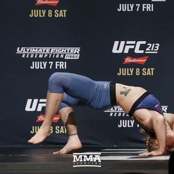 Valentina Shevchenko stretches during UFC 213 open workouts Wednesday at the Park Theater in Las Vegas, Nevada.