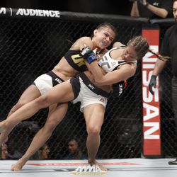 Claudia Gadelha and Karolina Kowalkiewicz battle at UFC 212.