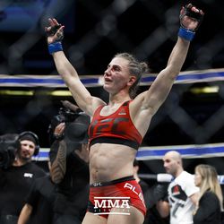 Alexsandra Albu celebrates her win at UFC 214.