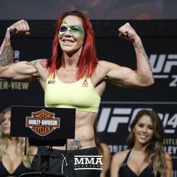 Cris Cyborg poses at UFC 214 weigh-ins.