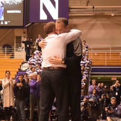 Northwestern head coach Chris Collins embraces Athletic Director Jim Phillips.