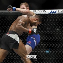 Danny Roberts trades punches with Bobby Nash at UFC Fight Night 113 on Sunday at the The SSE Hydro in Glasgow, Scotland.