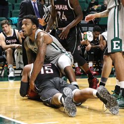 Ty Toney digging for a loose ball<br>