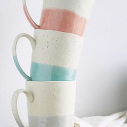 <a href="http://www.urbanoutfitters.com/urban/catalog/productdetail.jsp?id=33939372&category=GIFTS-UNDER12">Speckled Dip Mug</a> ($8)