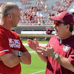 NCSU at FSU: Coach Jimbo Fisher chats with NC State head coach Dave Doeren before the game.
