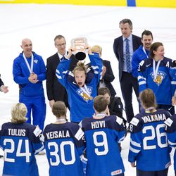 Team Finland celebrate winning the bronze medal.
