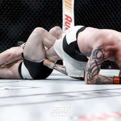 CB Dolloway looks to finish Ed Herman at TUF 25 Finale.