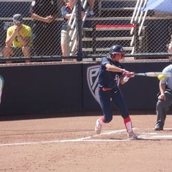 Reyna Carranco hits a pitch from Maggie Balint