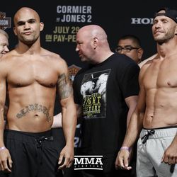 Robbie Lawler and Donald Cerrone post at UFC 214 weigh-ins.
