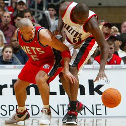 Jason Kidd #5 of the New Jersey Nets loses the ball to Zach Randolph #50 of the Portland Trail Blazers