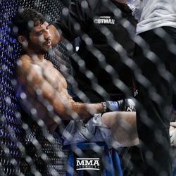 Gilbert Melendez gets his leg worked on at UFC 215.