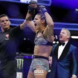 Poliana Botelho celebrates her win at UFC 216.