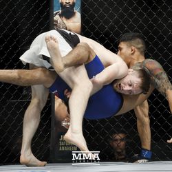 Brett Johns takes down Albert Morales at UFC Fight Night 113 on Sunday at the The SSE Hydro in Glasgow, Scotland.