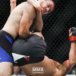 Jim Miller tries to avoid a submission at UFC 213.