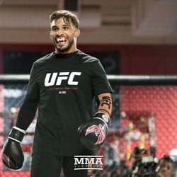 Dennis Bermudez showing off the mouth guard at UFC on FOX 25 open workouts Thursday at UFC Gym in New Hyde Park, N.Y.