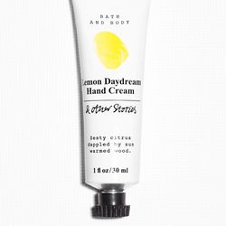& Other Stories <a href="http://www.stories.com/us/Beauty/Bath_Body/Hand_lotions/Lemon_Daydream_Mini_Hand_Cream/590723-101087639.1">Lemon Daydream Mini Hand Cream</a> ($8)