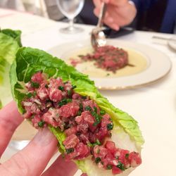 The tartare is served with lettuce on ice to make — of all things — lettuce wraps