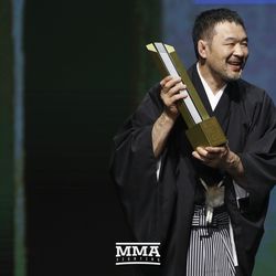 Kazushi Sakuraba accepts his UFC Hall of Fame honor at the induction ceremony Thursday night at Park Theater in Las Vegas.